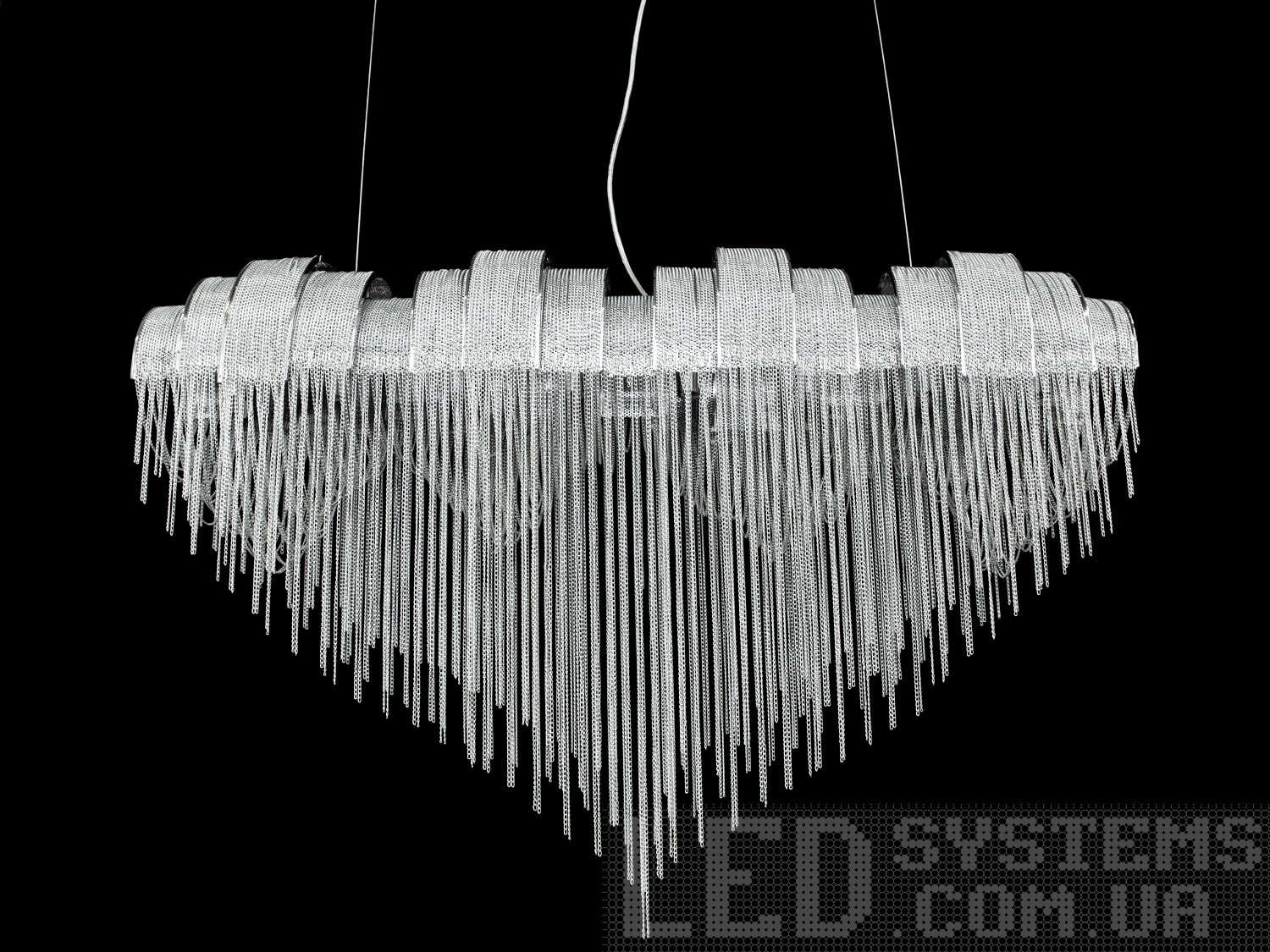 Люстра-підвіс з ланцюжками в класичному стилі для залів на 8 ламп кольору хром ідеально підійдуть для приміщень як з високими, так і з низькими стелями, сходів, залів, також для вітальні, спальні, кухні.&nbsp;Ми раді представити колекцію класичних люстр та бра під стандартну лампу із цоколем Е14.&nbsp;
Тисячі металевих ланцюжків м'яко розсіяють світло на ваше приміщення, створюючи мільйони тіней. Легка природна рухливість ланцюжків, реакція на вітер і проходження повз люстру, створюють затишне відчуття світла через листя.&nbsp;Люстра люстра має по істині неймовірну легкість і грацію.&nbsp;
Увага. Вага люстри понад 10кг.