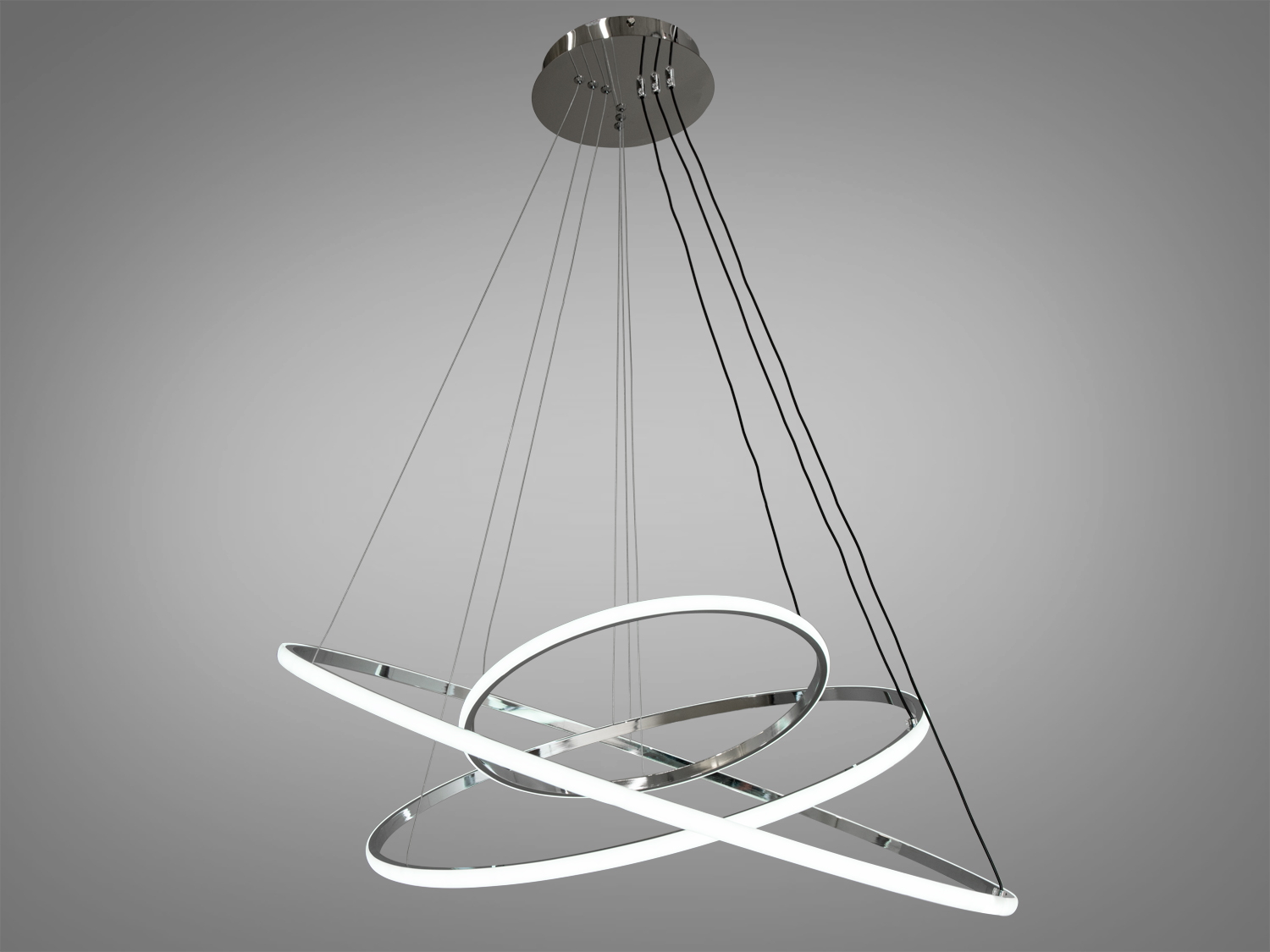 LED люстра-підвіс для зали з диммером, з пультом підходить на площу приміщення приблизно 20кв.м. Люстри-підвіси добре виглядають у вітальнях, коридорах, спальнях та в кухнях-студіях.
Можна вибрати режим освітлення: теплий, нейтральний чи холодний. Регулювання яскравості люстри від 5 до 100% відбувається за допомогою пульта дистанційного керування, що входить до комплекту.
Кільця виконані з алюмінію із силіконовим розсіювачем. Алюміній ідеальний матеріал для світлодіодних люстр - не іржавіє, добре відводить тепло від світлодіодних модулів, хромування набагато міцніше зчепляється з основою, ніж при анодуванні сталі. Силіконовий розсіювач м'яко розсіює світло, приховуючи ефект свічення окремих світлодіодів. Створюється відчуття, що вся поверхня розсіювача світиться сама. Не змінює колір навіть при температурах, що перевищують робочу, в кілька разів.
Кріпиться до стелі будь-якого типу універсальним кріпленням на монтажну планку.