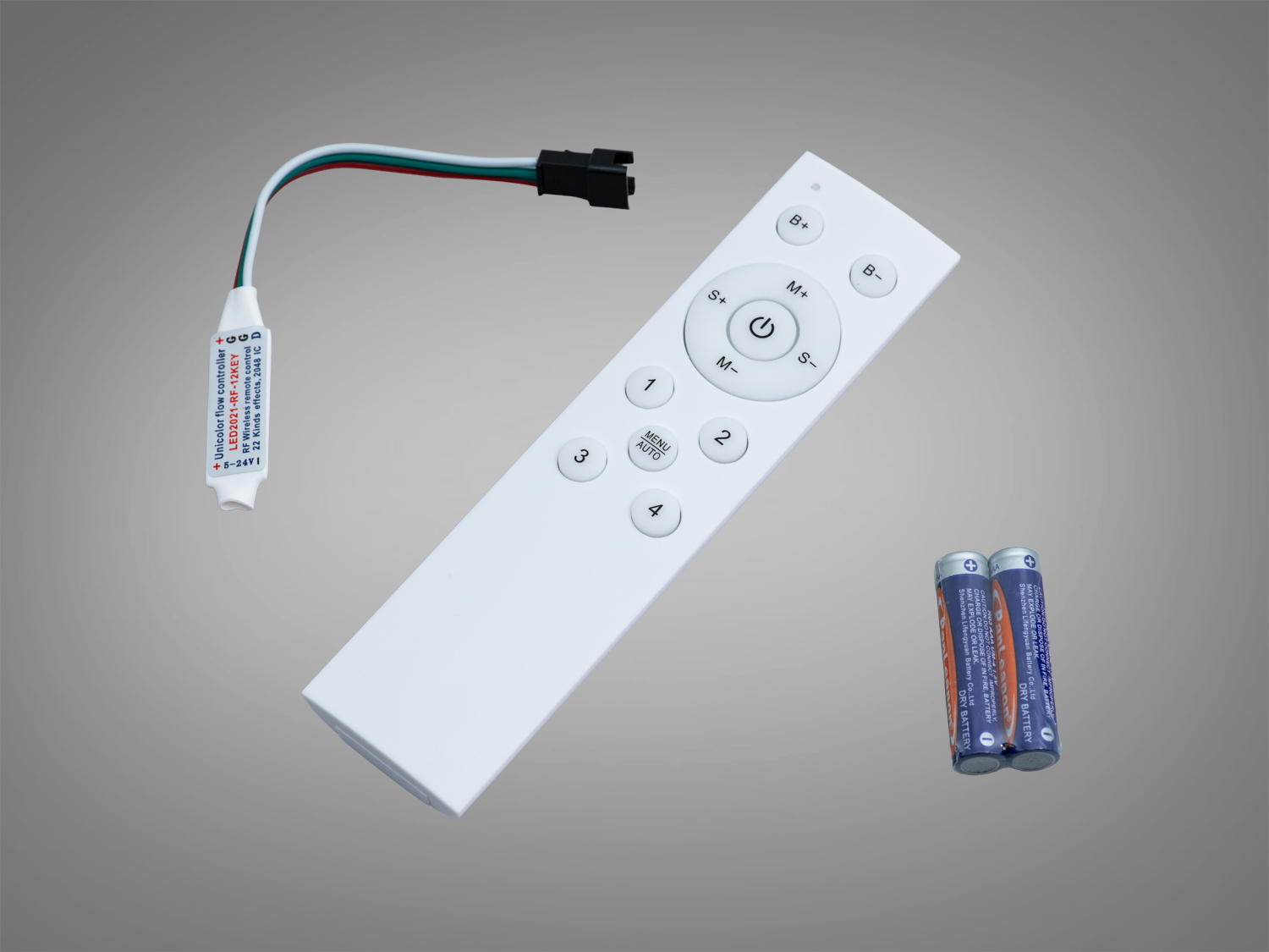 Контролер SPI Diasha 5–24 В для одноколірної адресної стрічки: пульт, до 22 ефектів, регулювання яскравості та швидкості. Компактний білий корпус.