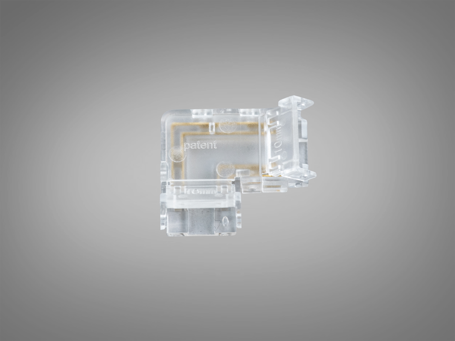 Прозорий кутовий конектор Diasha для COB стрічки 10 мм 4‑pin. Безпайкове L‑з’єднання з пробивним контактом і майже непомітним стиком під 90°.