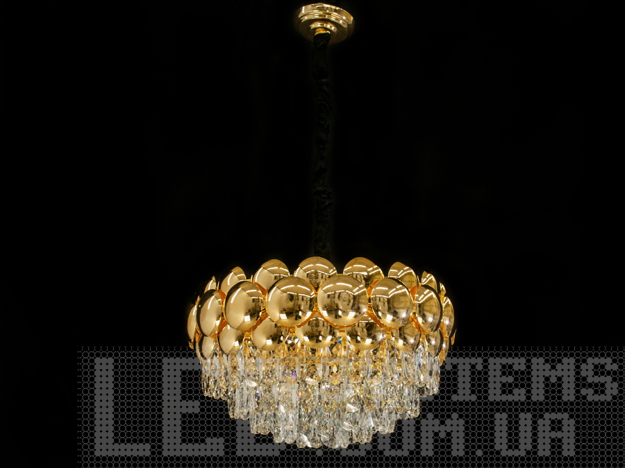 Сучасна кришталева люстра для вітальні в сучасному стилі з металевим корпусом добре буде виглядати в інтер'єрі залу, вітальні, спальні, їдальні. Висота люстри регулюється, завдяки чому підходить для невеликих кімнат і низьких стель.&nbsp;У класичний інтер'єр вона вносить нотки сучасності, і легкої грайливості, а квартирі студії в стилі лофт дарує крапельку строгості і впорядкованості. Стельове кріплення на планку універсальне і підходить для навісних, натяжних і звичайних стель.&nbsp;Люстра-подвес під звичайні лампочки розжарювання, економки, або світлодіодні лампи з цоколем Е14.&nbsp;
Увага. Вага люстри більше 10кг.