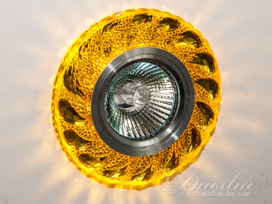 Зазвичай точкові світильники призначаються для підвісних стель і для підсвічування різних ніш або робочої поверхні. Конструктивно точковий світильник складається з двох частин: видимої - декоративної та вбудованої - функціональною. Функціональна частина світильників складається з каркаса, куди вставляється джерело світла та кріпиться декоративна частина, а також затискачів, які призначені для кріплення світильника до стелі. Різноманітність декоративної частини точкових світильників&nbsp;дозволяє зробити Ваш інтер'єр неповторним. Головні якості сучасних точкових світильників - це рівномірне освітлення всього приміщення з можливістю акцентування необхідних деталей інтер'єру. 
Для оптових покупців відпускається лише ящиками по 50 шт. 
Лампа і трансформатор в комплект не входять.