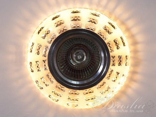 Зазвичай точкові світильники призначаються для підвісних стель і для підсвічування різних ніш або робочої поверхні. Конструктивно точковий світильник складається з двох частин: видимої - декоративної та вбудованої - функціональною. Функціональна частина світильників складається з каркаса, куди вставляється джерело світла та кріпиться декоративна частина, а також затискачів, які призначені для кріплення світильника до стелі. Різноманітність декоративної частини точкових світильників&nbsp;дозволяє зробити Ваш інтер'єр неповторним. Головні якості сучасних точкових світильників - це рівномірне освітлення всього приміщення з можливістю акцентування необхідних деталей інтер'єру. 
Для оптових покупців відпускається лише ящиками по 50 шт. 
Лампа і трансформатор в комплект не входять.