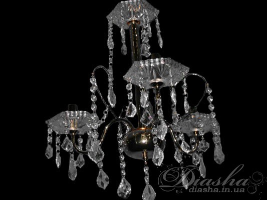 Здавалося б, що у всіх кришталевих люстр схожий дизайн і важко уявити що-небудь нове. Але ось перед Вами кришталева люстра, яка повністю змінює звичний образ. Її незвичайний дизайн продуманий до самих найтонших дрібниць. А як подбали виробники про можливість вибору всіляких відтінків. Навіть просте їх перерахування дає широкий простір для Вашої фантазії - золото + шампань, золото + прозорий, димчастий + хром. 
Невисока ціна і застосування різного типу ламп також має велике значення. На Ваш розсуд, це можуть бути лампи розжарювання, економки, або світлодіодні лампи на патрон E14. Ця люстра по-справжньому прикрасить будь-яку кімнату у Вашій квартирі і викличе законне захоплення рідних та друзів.