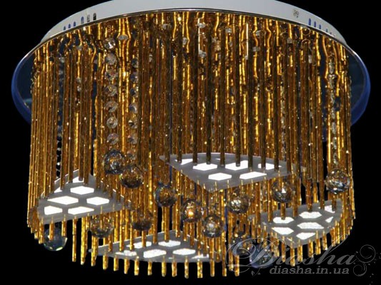 Незрівнянна галогенова люстра &laquo;торт&raquo; зі світлодіодним підсвічуванням, порежімним включенням і пультовим управлінням. Ось скільки відразу чудових характеристик ми запропонували Вашій увазі. Нова модель люстри-торт з діодним підсвічуванням подарує всім феєричне відчуття щастя і радісного настрою, вдихне трохи свята серед звичайних буднів, стане бездоганною прикрасою будь-якої кімнати. Все управління світлодіодами проводиться за допомогою однієї кнопки на пульті .
 Галогенові люстри з діодним підсвічуванням чудово впишуться в будь-який інтер'єр, будь то спальня або вітальня, готель чи елітний ресторан. 
Дивуючий і оригінальний дизайн, дивовижні кольори діодів - ви залишитеся задоволені.