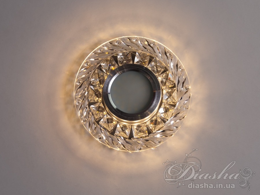 &nbsp;&nbsp;&nbsp;Точкові світильники прості та легкі в установці, тому їх монтування не займе багато часу та праці. Вони запросто можуть змінити простір приміщення. Якщо точкові світильники встановити по периметру стелі, то він буде здаватися вище, а сама кімната - набагато більше. Прийміть це як керівництво до дії. І тоді ці кришталеві точкові світильники будуть здатні забезпечити Вам комфорт саме на тому рівні, якого Ви так довго чекали. Для оптових покупців відпускається лише ящиками по 50 шт.
Конструкція світильника ідеально розрахована на використання з натяжними стелями.
&nbsp;&nbsp;&nbsp;Лампа і трансформатор в комплект не входять.