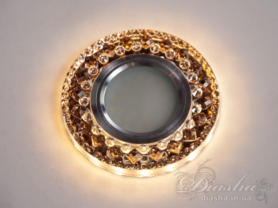 &nbsp;&nbsp;&nbsp;Точкові світильники прості та легкі в установці, тому їх монтування не займе багато часу та праці. Вони запросто можуть змінити простір приміщення. Якщо точкові світильники встановити по периметру стелі, то він буде здаватися вище, а сама кімната - набагато більше. Прийміть це як керівництво до дії. І тоді ці кришталеві точкові світильники будуть здатні забезпечити Вам комфорт саме на тому рівні, якого Ви так довго чекали. Для оптових покупців відпускається лише ящиками по 50 шт.
Конструкція світильника ідеально розрахована на використання з натяжними стелями.
&nbsp;&nbsp;&nbsp;Лампа і трансформатор в комплект не входять.