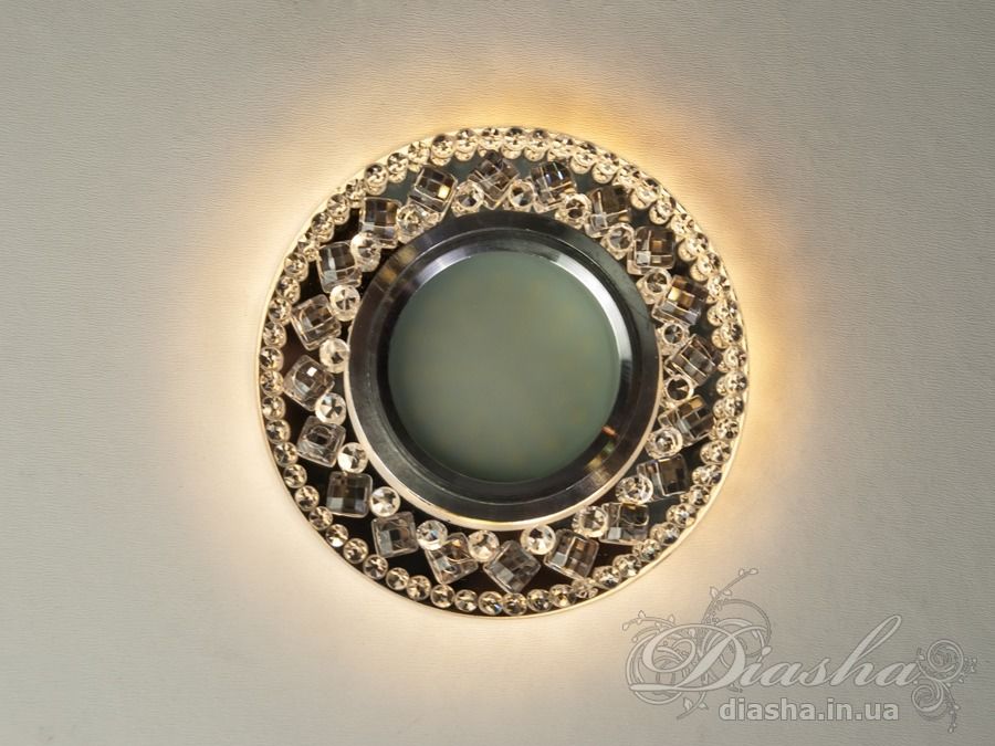 &nbsp;&nbsp;&nbsp;Точкові світильники прості та легкі в установці, тому їх монтування не займе багато часу та праці. Вони запросто можуть змінити простір приміщення. Якщо точкові світильники встановити по периметру стелі, то він буде здаватися вище, а сама кімната - набагато більше. Прийміть це як керівництво до дії. І тоді ці кришталеві точкові світильники будуть здатні забезпечити Вам комфорт саме на тому рівні, якого Ви так довго чекали. Для оптових покупців відпускається лише ящиками по 50 шт.
Конструкція світильника ідеально розрахована на використання з натяжними стелями.
&nbsp;&nbsp;&nbsp;Лампа і трансформатор в комплект не входять.